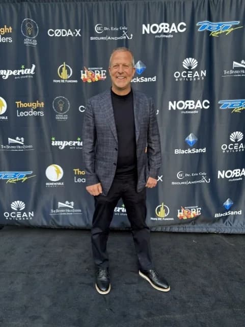 Travis Flateau at a speaking event.